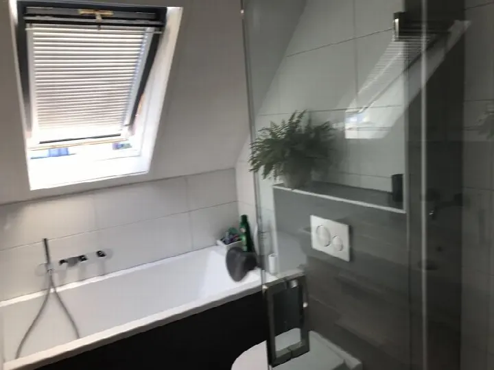 Badkamer onder schuin dak